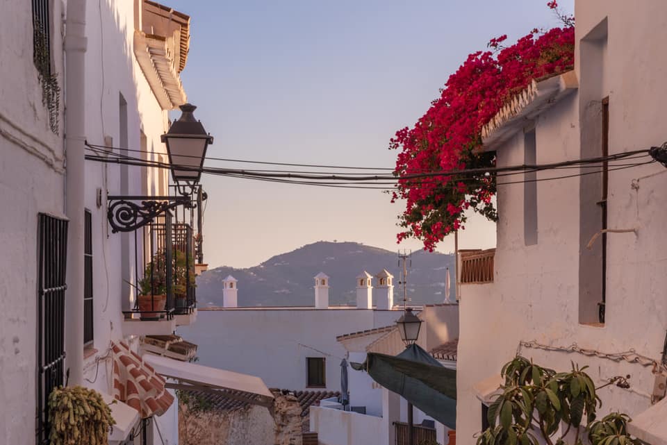 Frigiliana hillside homes in afternoon light